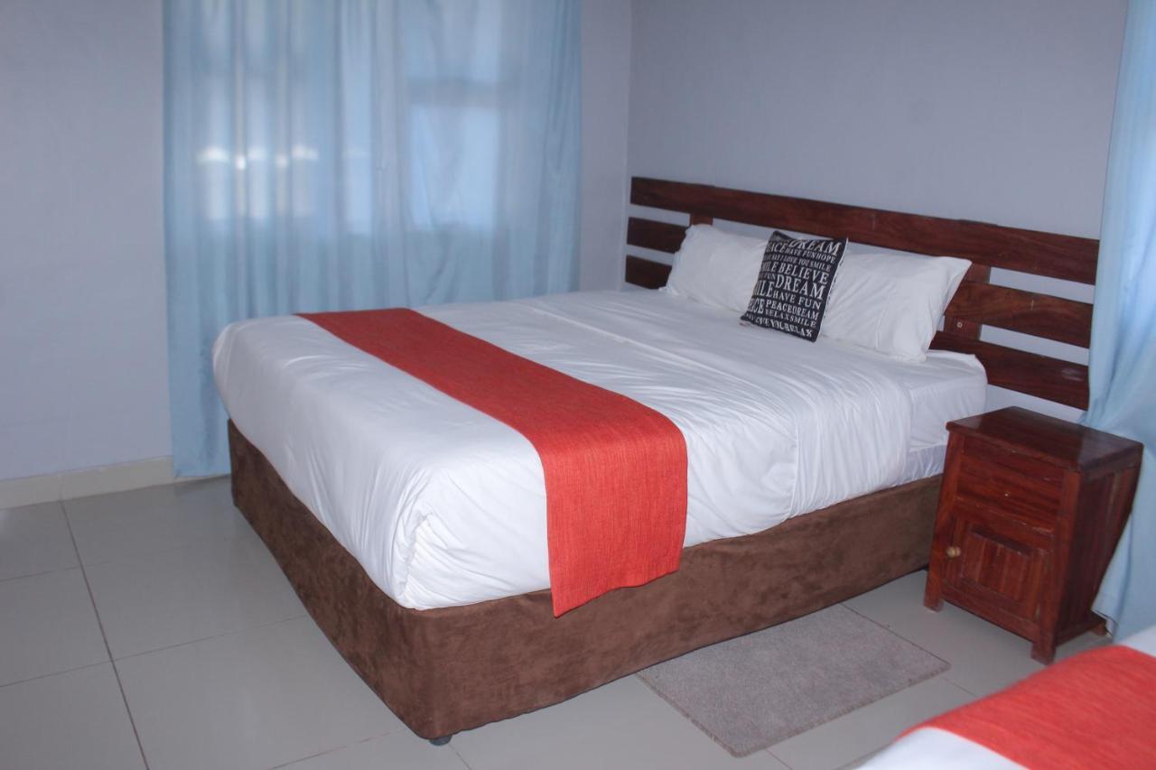 Global Guest House คาซาเนอ ภายนอก รูปภาพ
