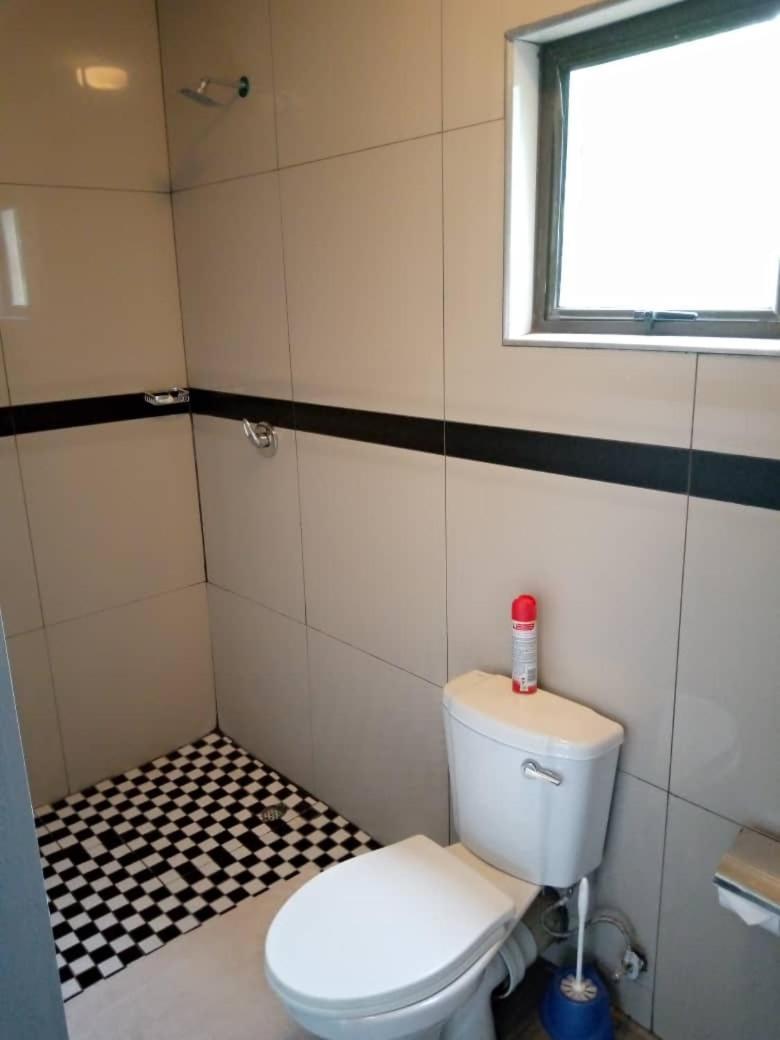 Global Guest House คาซาเนอ ภายนอก รูปภาพ