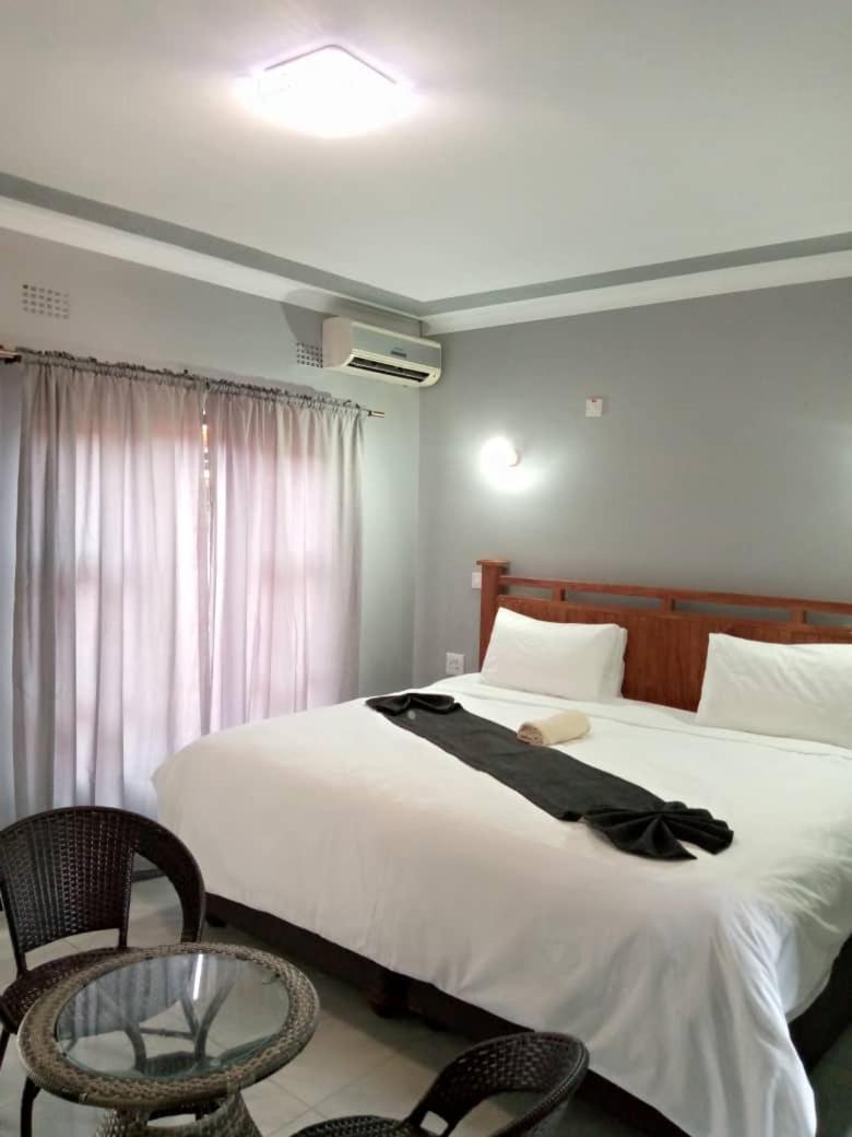 Global Guest House คาซาเนอ ภายนอก รูปภาพ