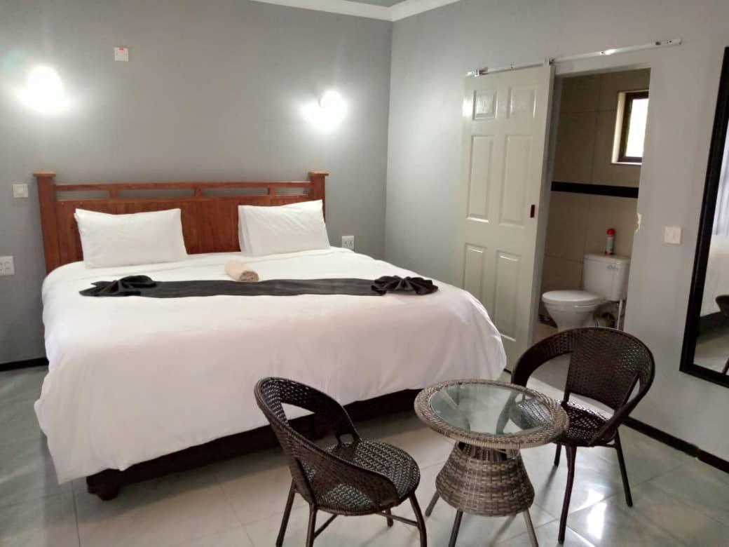 Global Guest House คาซาเนอ ภายนอก รูปภาพ